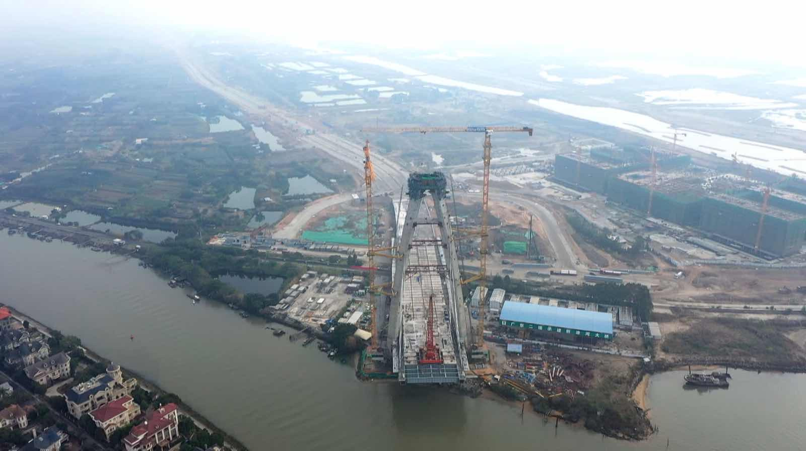中阳大道新津河大桥主塔封顶 明年6月底将建成通车