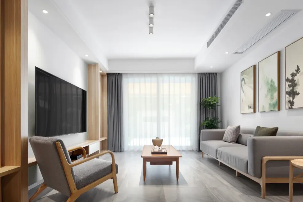 客厅的装修风格以自然简约为主,空间宽敞通透,采光优良,给人明朗敞亮