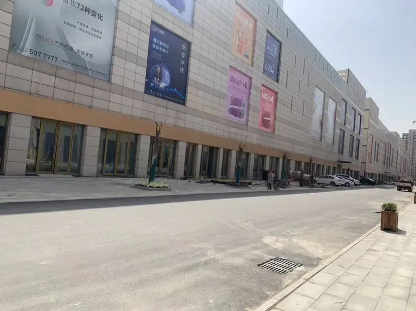 学校旁边层高五米四买一层得两层沿街商铺