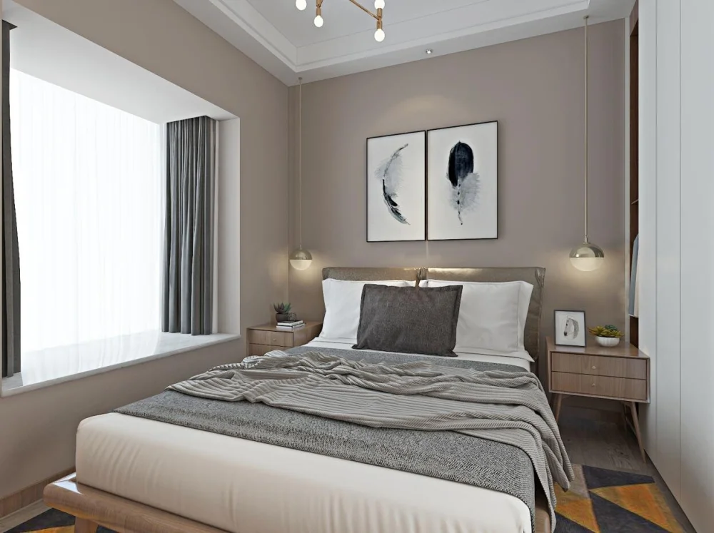 卧室主要就是所有的台灯都考虑做从顶上下掉的台灯方式,不占用床头柜